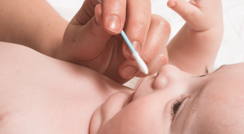 Baby’s nose being swabbed for court-ordered paternity test